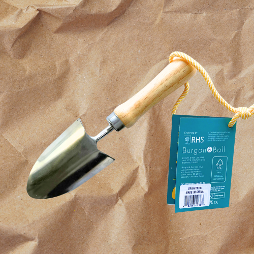 Ergonomic Stainless Steel Garden Trowel with Rubberwood Handle on kraft paper background