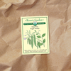 Snap Sugar Daddy Organic seed packet on a kraft paper background