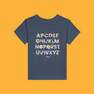Little Gardeners Navy ABC Toddler T-Shirt featuring a colorful garden-themed ABC illustration on a soft cotton tee on a yellow background