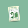 A seed packet featuring an illustration of slender, bright green bush beans growing on compact plants on a sage green backgound.