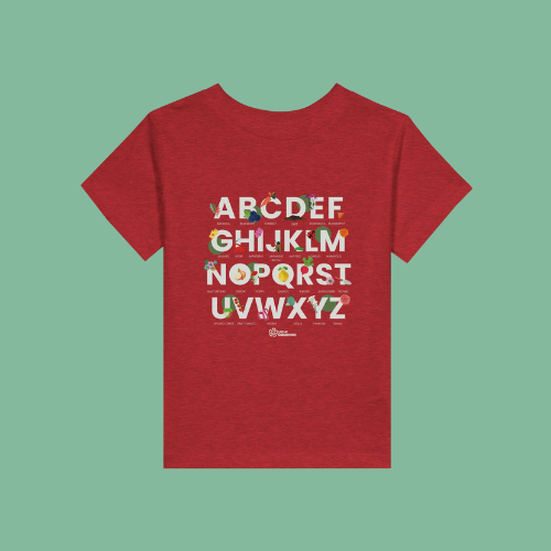 Little Gardeners Red ABC Toddler T-Shirt featuring a colorful garden-themed ABC illustration on a soft cotton tee on a light green background.