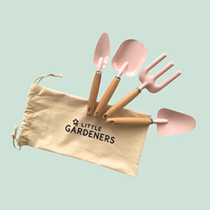 Set of gardening tools including shovels and a fork in a 'Little Gardeners' branded pouch on a light blue background.